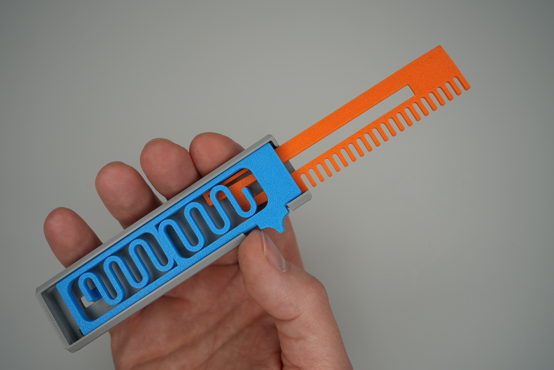 OTF pop out knife/comb